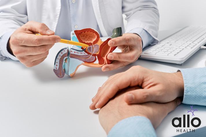 a doctor explaining patient about why penis growth oils don't work