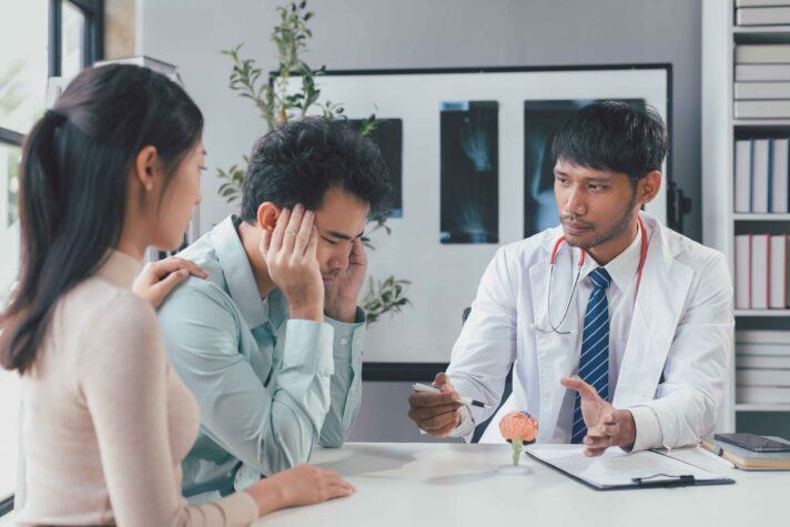 What Does Priapism Mean? 2 doctor explaining brain anatomy to sad couple duri 2024 08 20 00 09 04 utc 1